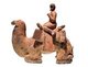 China: A Central  Asian depicted as a camel driver. Chinese terracotta sculpture from the Northern Wei Dynasty (386-534 AD)
